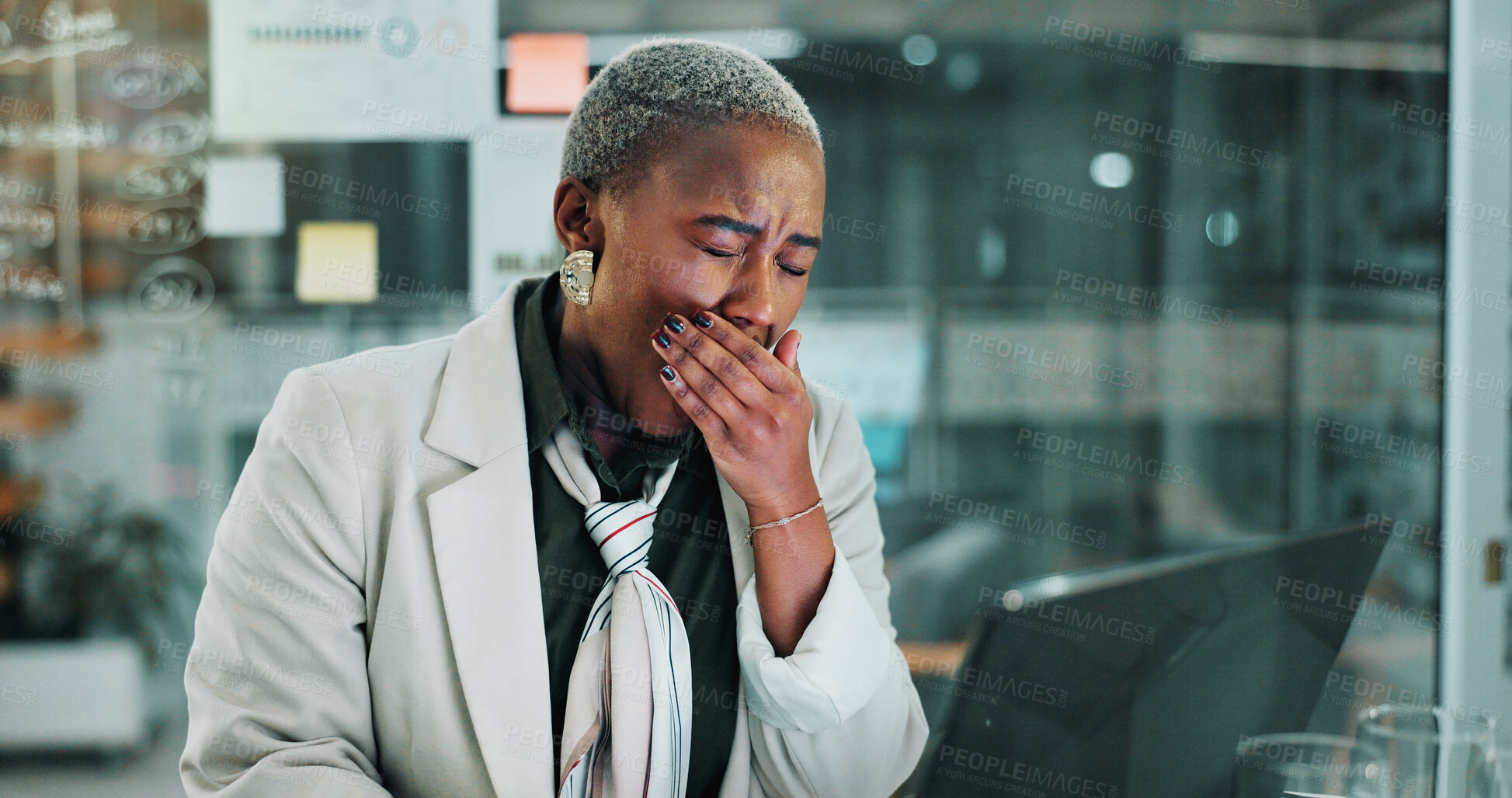 Buy stock photo Tired, investor and black woman in office, laptop for stock market and exhausted. African person, low energy and financial advisor in workplace, yawn and pc for investment info, fatigue and sleepy
