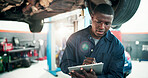 Mechanic, inspection and black man with checklist and car in repair shop for diagnostic, transport or calibration. Engineering, maintenance and person with lens flare in garage for service report