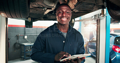 Buy stock photo Mechanic, portrait and black man with tablet in car repair shop for diagnostic system, transport or calibration. Engineering, maintenance and tech with happy person in garage for service report