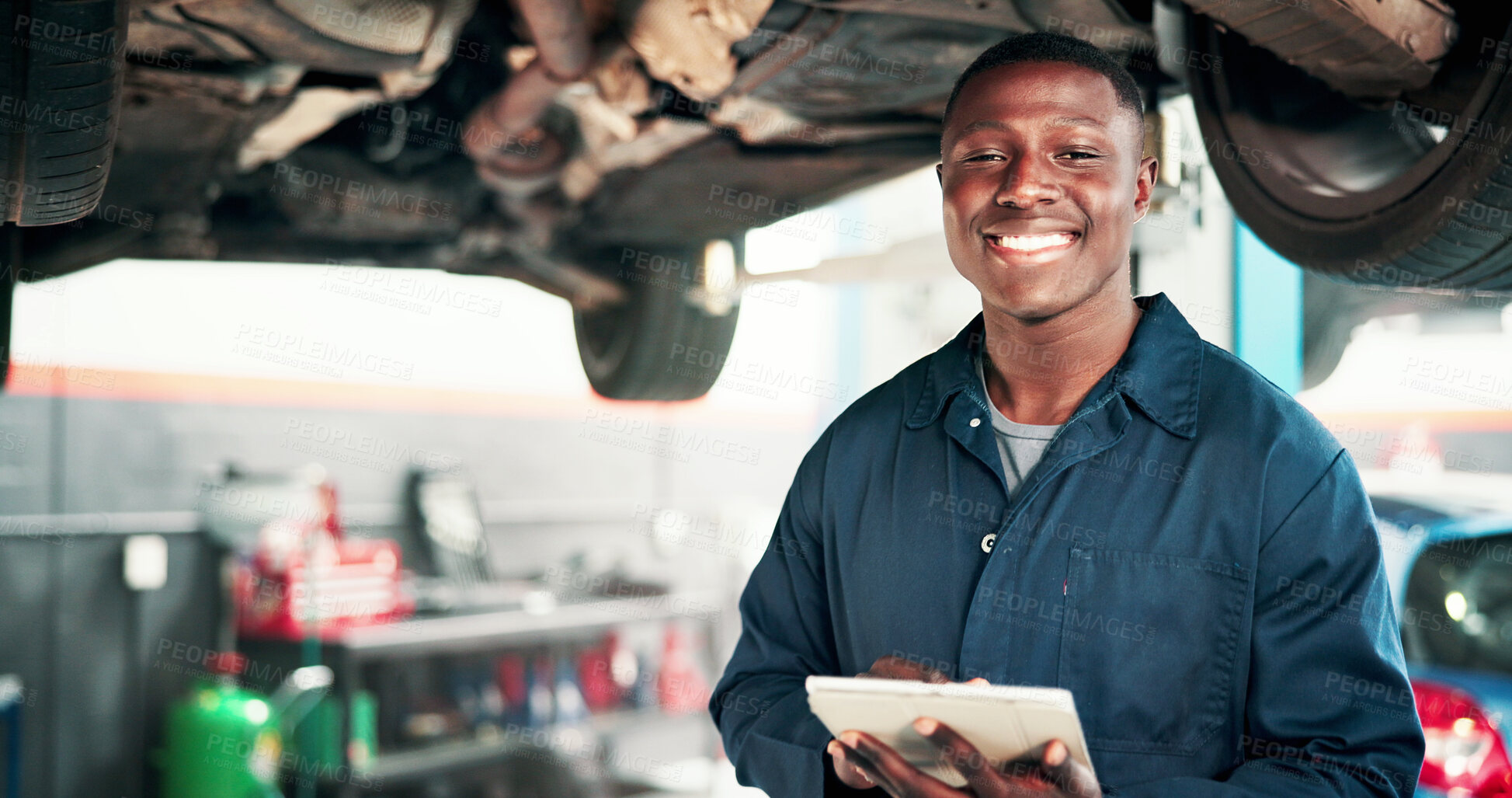 Buy stock photo Mechanic, portrait and black man with tablet and car in repair shop for diagnostic system, transport or calibration. Engineering, maintenance and technician with person in garage for service report