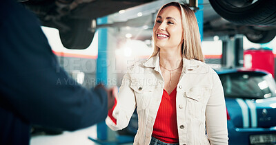 Buy stock photo Happy woman, customer or handshake with mechanic for fix, automotive service or repair in garage. Female person, engineer or shaking hand with smile for mechanical diagnostic or thank you in workshop