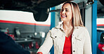 Happy woman, customer or handshake with mechanic for repair fix or automotive service in garage. Female person, engineer or shaking hands with smile for mechanical inspection or agreement in workshop