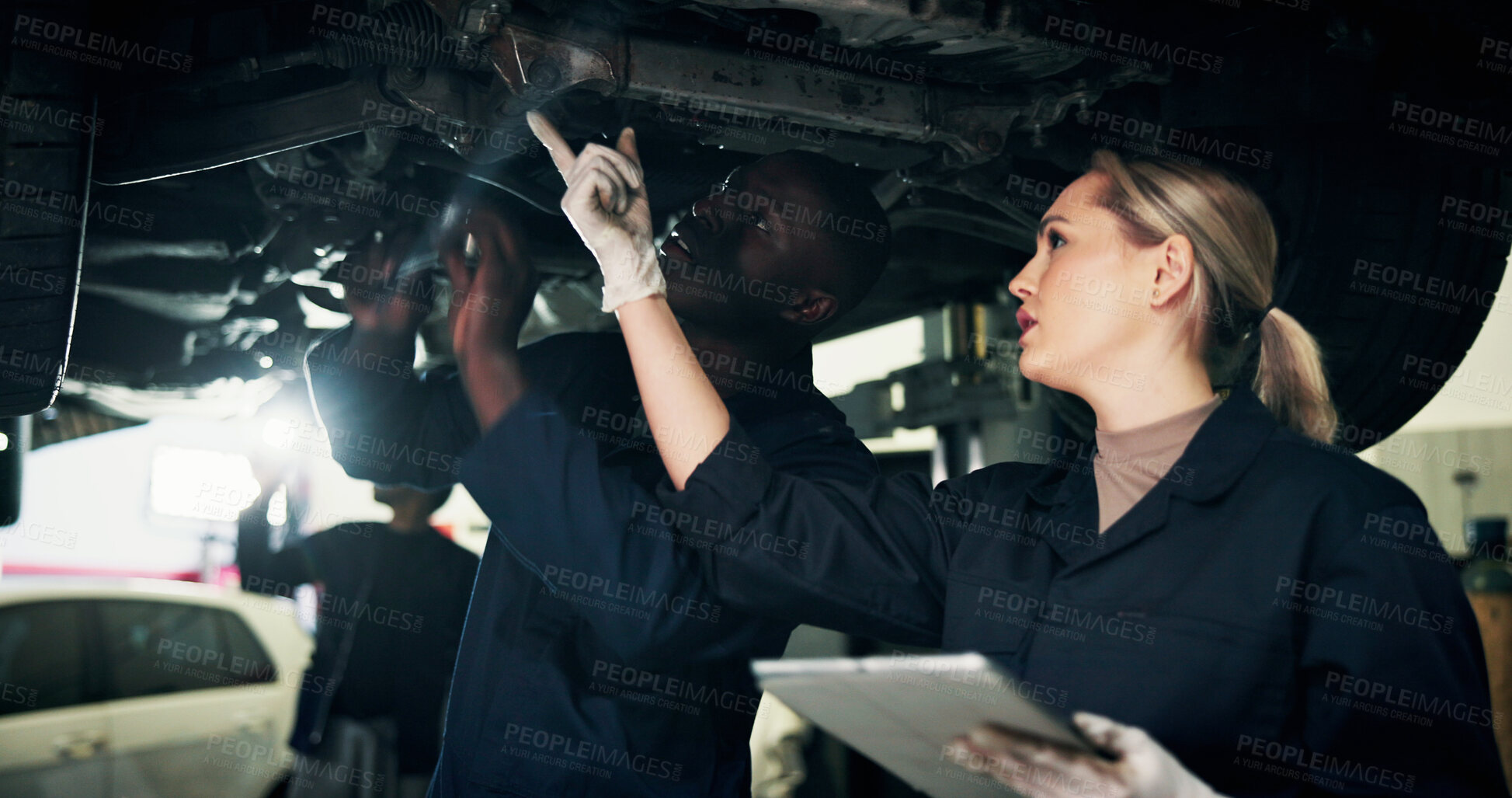 Buy stock photo Mechanic, workshop and people on tablet with car for inspection, report and vehicle diagnostics. Team, garage and woman with tech for motor repair, maintenance and technician for engine service