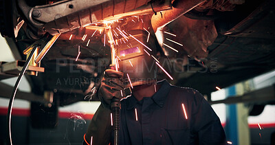 Buy stock photo Mechanic, welding and person with tools by car for diagnostics, maintenance or auto service. Workshop, sparks and technician with equipment for vehicle inspection, fixing or engine repair with helmet