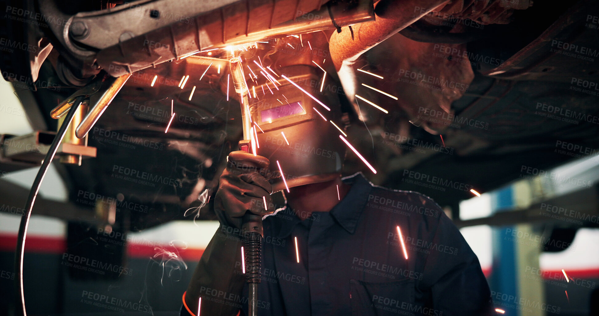 Buy stock photo Mechanic, welding and person with tools by car for diagnostics, maintenance or auto service. Workshop, sparks and technician with equipment for vehicle inspection, fixing or engine repair with helmet