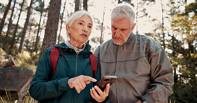 Buy stock photo Hiking, old couple and talking with smartphone in woods, lost and searching for location on website. Outdoor, backpacker and elderly people with digital map on holiday, low angle and travel together