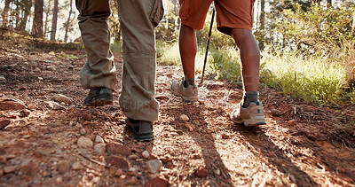 Buy stock photo Fitness, people and legs with hiking in forest for adventure, cardio exercise and exploring nature. Back, shoes and trekking on trail for wellness journey, weekend break and hobby in countryside