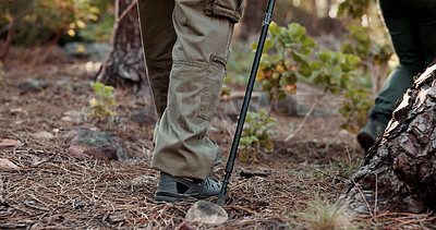Buy stock photo Legs, person and trekking pole on trail for travel adventure, field research or nature observation. Ecologist back, balance and feet on hiking expedition for eco tourism, exploring forest and journey