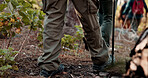 Legs, group and hiking pole on trail for travel adventure, field research and nature observation. Back, balance and feet of people on trekking expedition for eco tourism, ecology journey or discovery