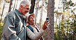 Nature, hiking and selfie with people and smile for adventure with retirement, wellness and health. Travel, picture and mature interracial couple with digital tech for social media, memory and post