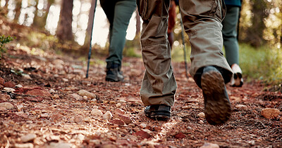Buy stock photo Fitness, people and legs with hiking in woods for adventure, cardio exercise and exploring nature. Back, friends and trekking on trail for wellness journey, weekend break and hobby in countryside