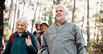 Senior, friends and happy hiking in forest for travel adventure, sightseeing nature and walk. Active retirement, old people and trekking together in woods for exploring, fresh air and wellness hobby