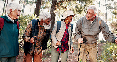 Buy stock photo Senior, group and hiking discovery in forest for travel adventure, field research or eco tourism. Voluntary conservation, sticks or old people trekking in woods for expedition, ecology study or trail