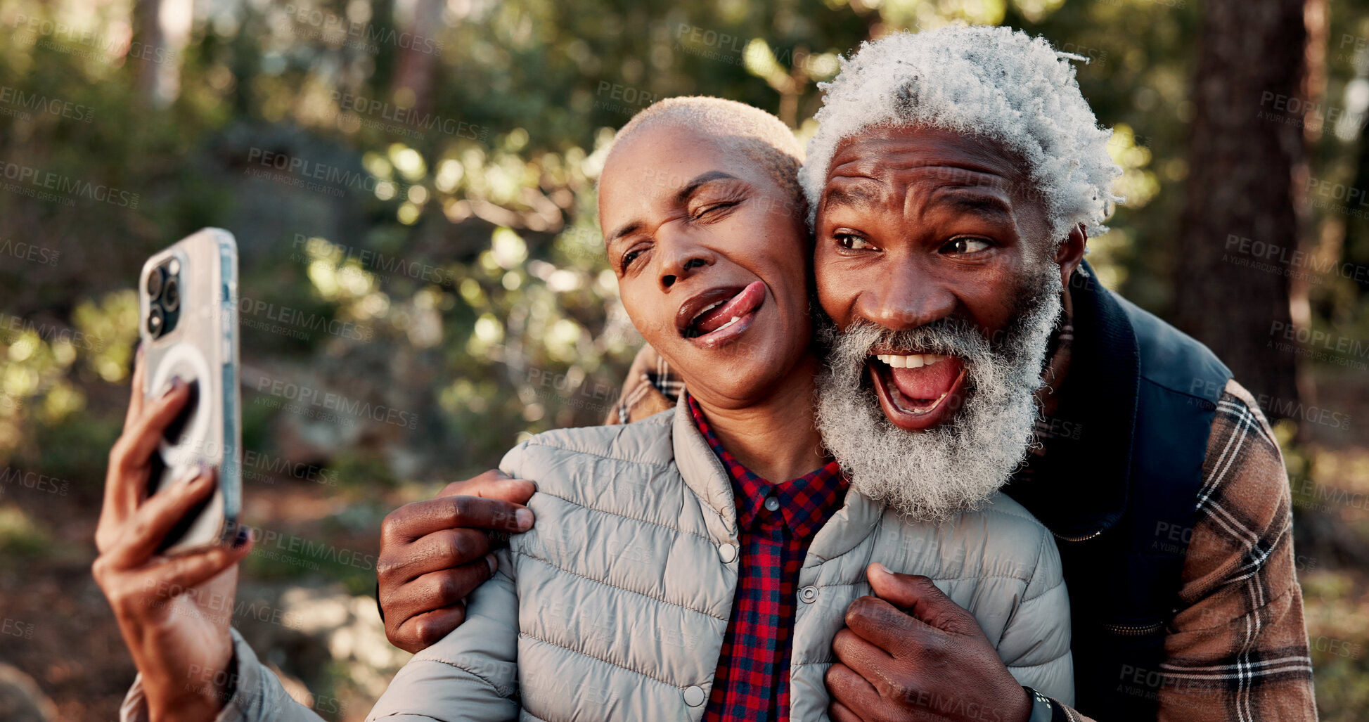 Buy stock photo Nature, hiking and selfie with silly couple and smile for adventure with retirement, wellness and health. Travel, picture and mature people with digital tech for social media, memory and post