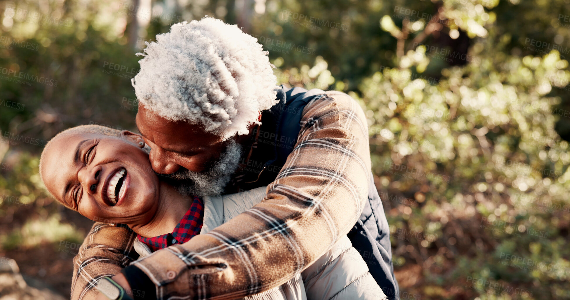 Buy stock photo Laughing, old couple and hug on holiday in nature, retirement and bonding with partner on adventure. Outdoor, senior traveler and black people with embrace on vacation, happiness and romance at park