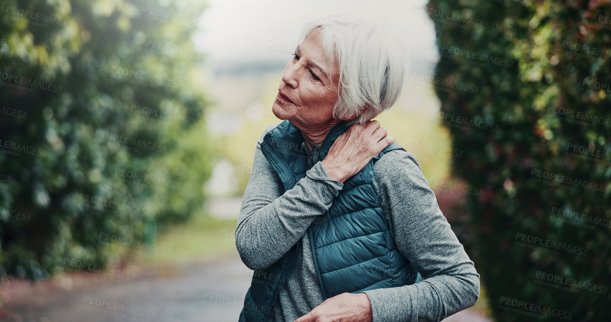 Buy stock photo Outdoor, fitness and senior woman with neck pain on break, hurt or joint tension with workout injury. Park, exercise and old person with inflammation after training accident, space and muscle strain