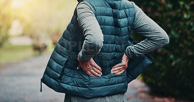 Buy stock photo Workout, injury and hands with back pain, outdoor or joint tension with pressure in morning on break. Park, exercise and old person with muscle strain after training accident, hurt and bad posture