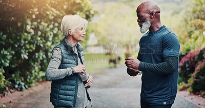 Buy stock photo Fitness, park and old couple with water on break for health, wellness and conversation. Bottle, senior man and woman with workout recovery, hydration and rest with interracial people outdoor