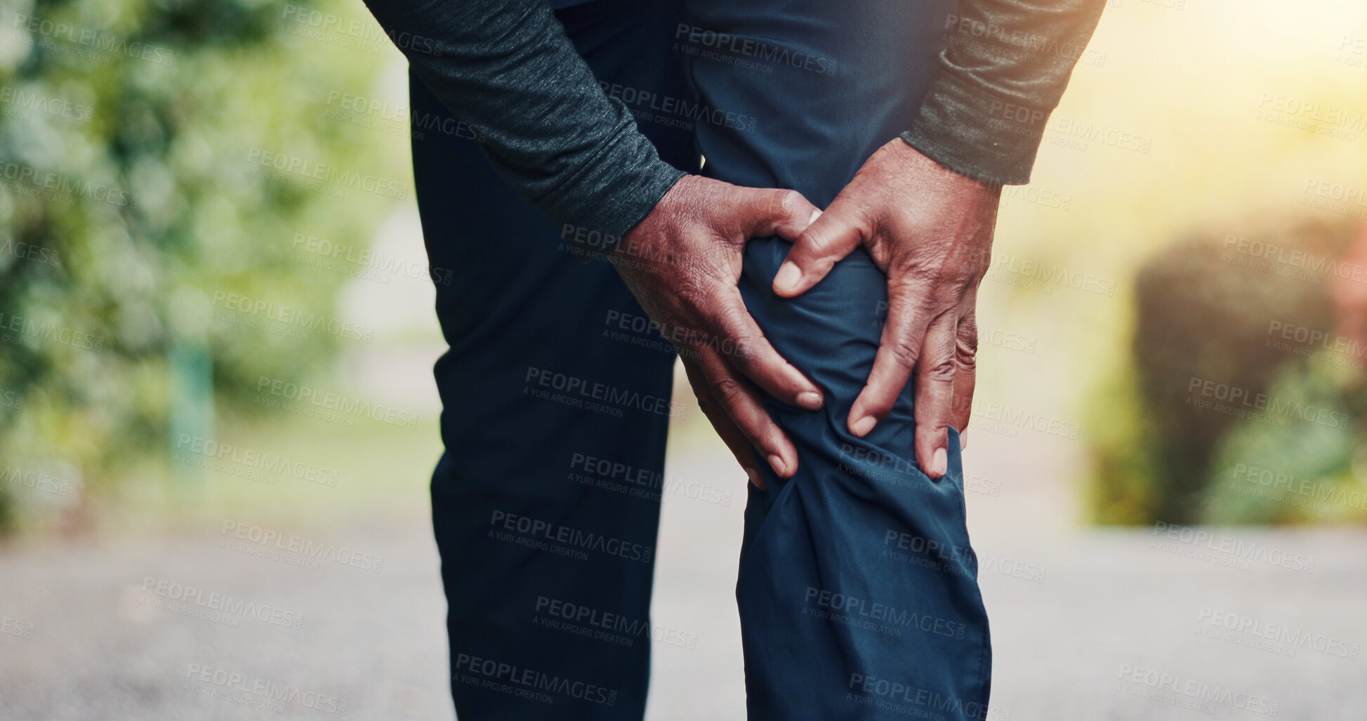 Buy stock photo Park, fitness and hands of man with knee pain for strain after exercise, workout and running. Nature, sports and person with leg injury for joint ache, inflammation and accident for training outdoor