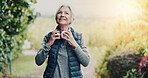 Fitness, thinking and old woman at park with headphones for music, health podcast or happiness. Vision, runner or person with audio tech for exercise motivation, workout playlist or active retirement