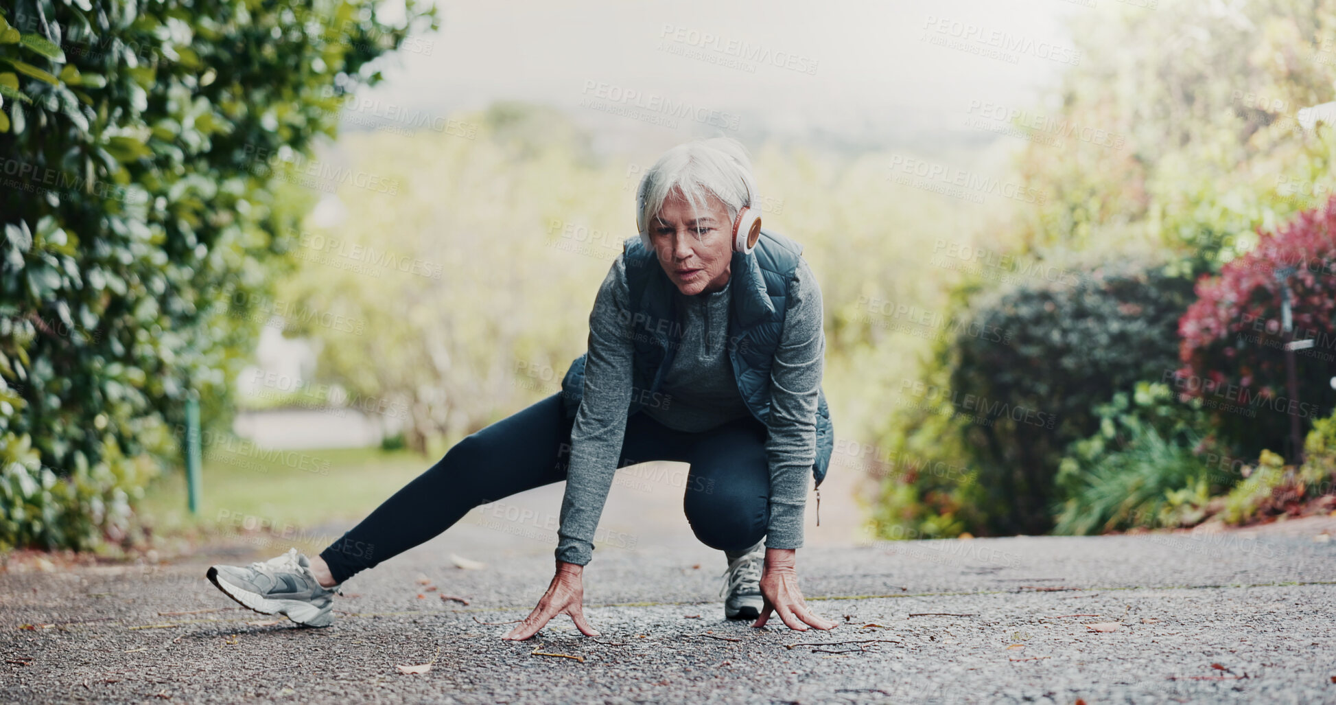 Buy stock photo Stretching, fitness and senior woman in nature for workout, training or running with wellness. Health, sports and elderly female person with leg warm up for cardio exercise outdoor at park in morning