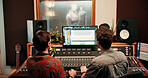 Sound engineer, screen or team in recording studio for music, composition or song quality. Collaboration, mixing audio or men editing on computer monitor for equalizer, creative production and back