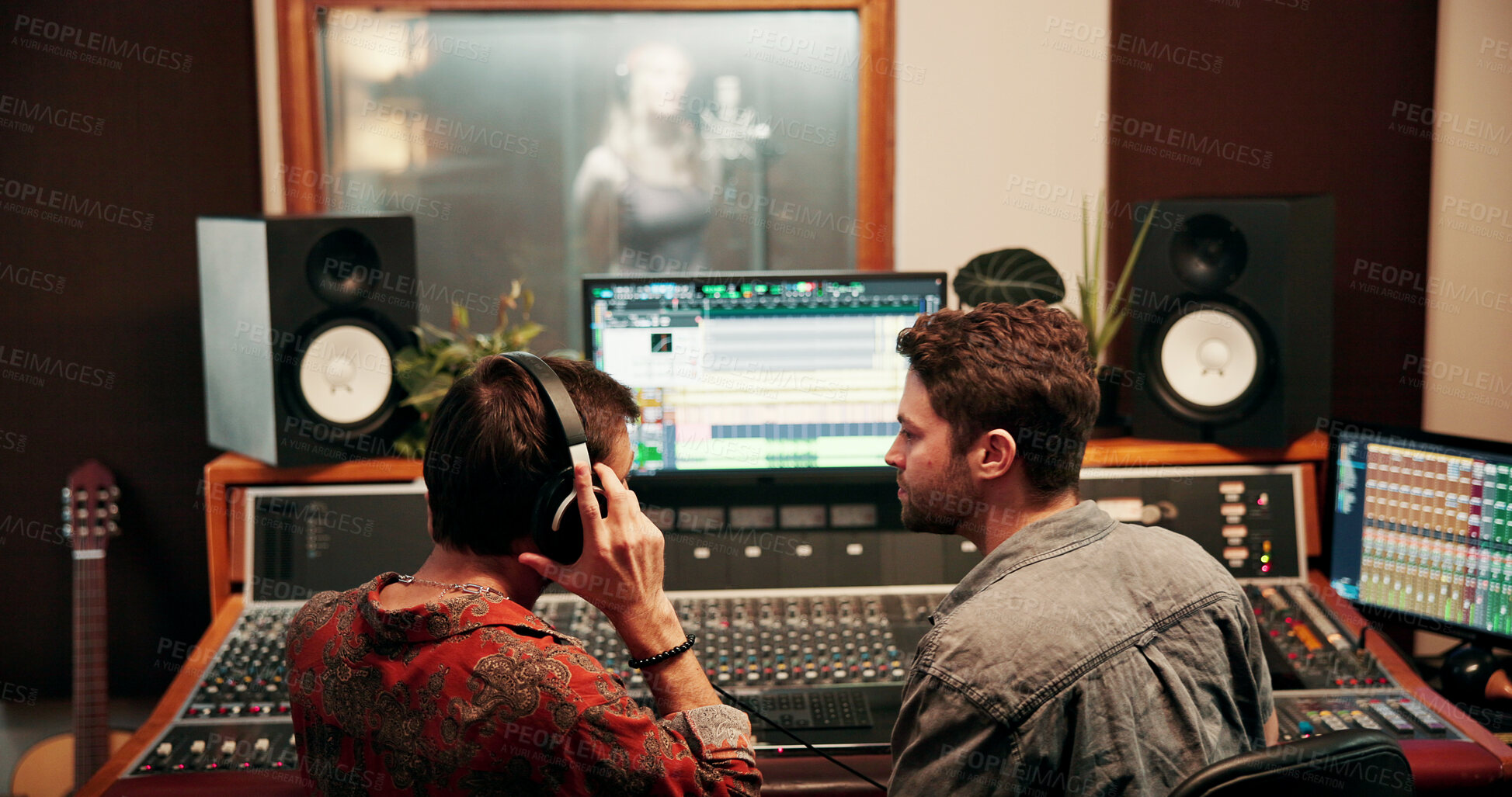 Buy stock photo Sound engineer, screen or team in recording studio with headphones, workstation or music quality. Collaboration, mix audio or men editing on computer monitor for talk, creative production and back