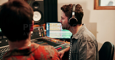Buy stock photo Sound engineer, team and mixing console in recording studio, headphones or music quality. Collaboration, audio and men editing on computer software for volume, creative production and DAW composition