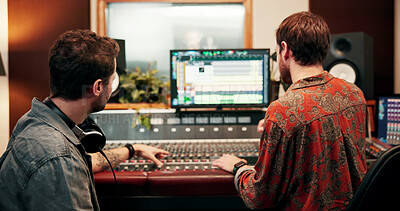 Buy stock photo Back, music and sound board with people in studio together for audio engineering or production. Display, recording and synthesizer with producer team in control room for balance, editing or mixing