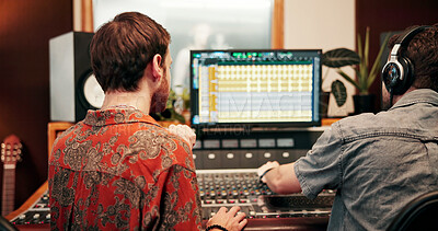 Buy stock photo Back, music and sound board with team in studio together for audio engineering or production. Equipment, recording and synthesizer with DJ people in control room for balance, editing or mixing