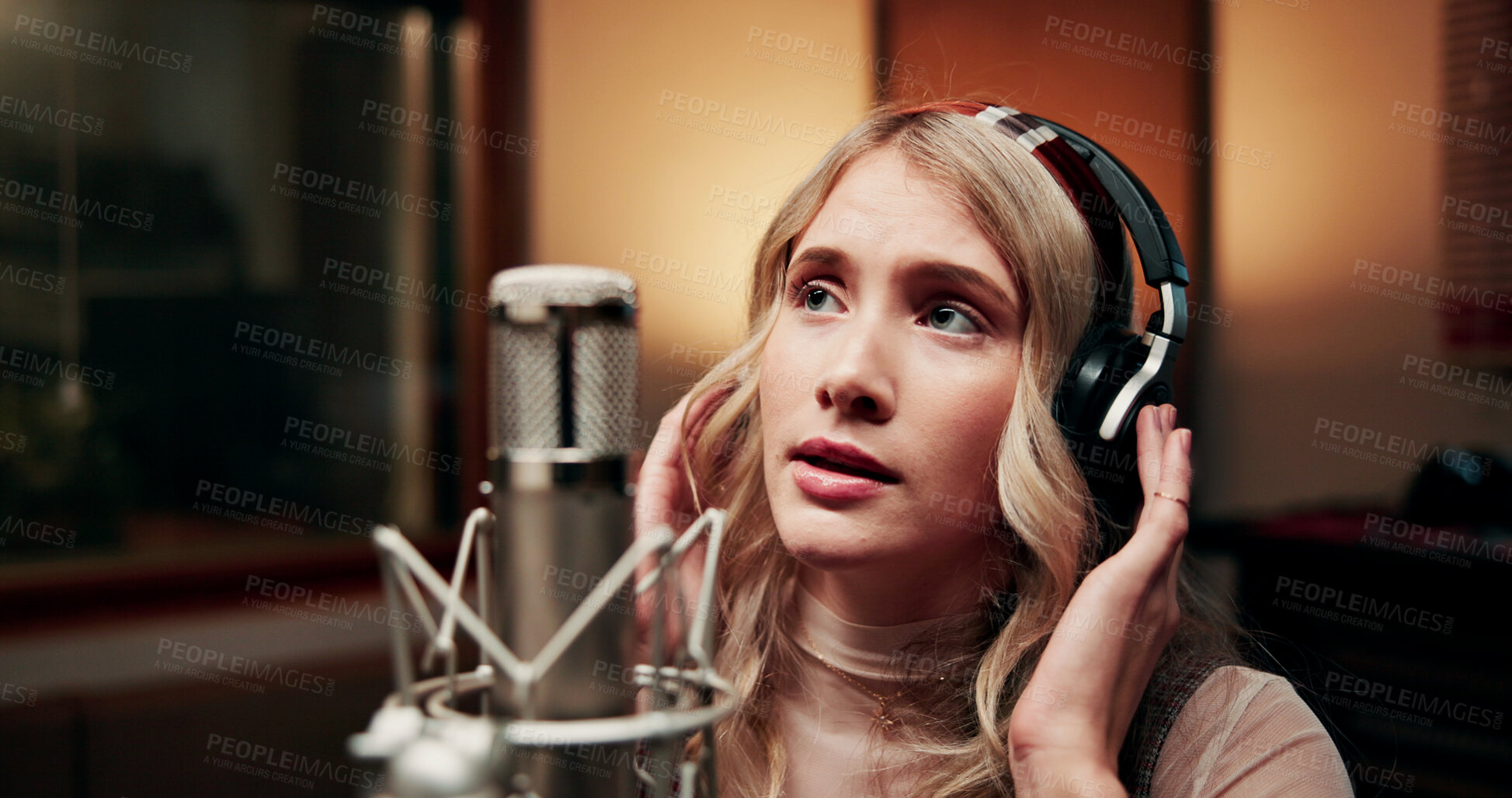 Buy stock photo Music, microphone and woman in studio with headphones, production or musician in performance. Talent, pop recording or singer in booth with tech, song or sound entertainment for creative album.
