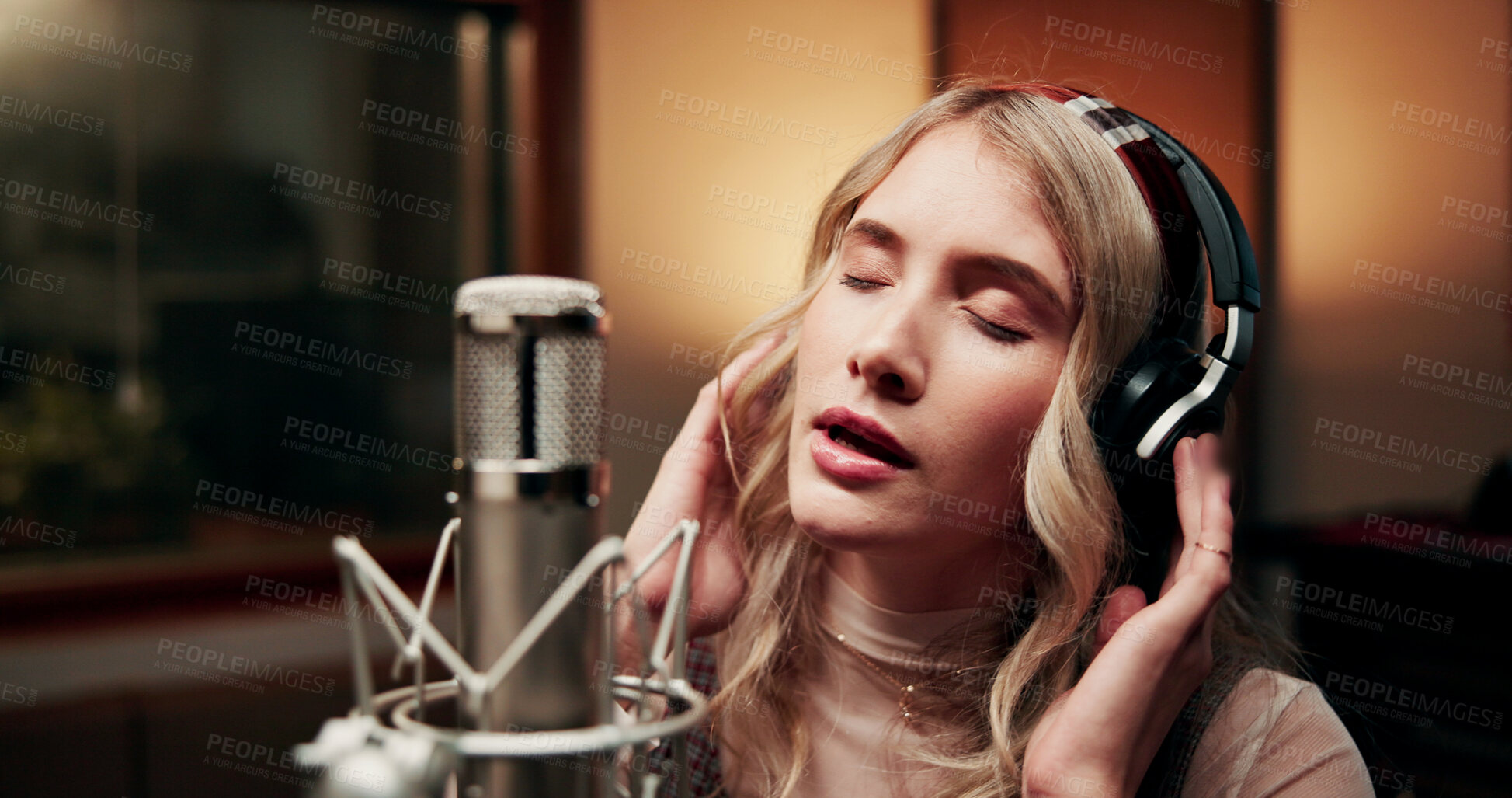Buy stock photo Music, microphone and person in studio with headphones, production or musician in performance. Talent, pop recording or singer in booth with tech, song or sound entertainment for creative album.