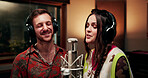 Singing, microphone and team with headphones in recording studio, vocal capture and song rehearsal. Tech, music artist and people with performance for album feature, creative or talent for production