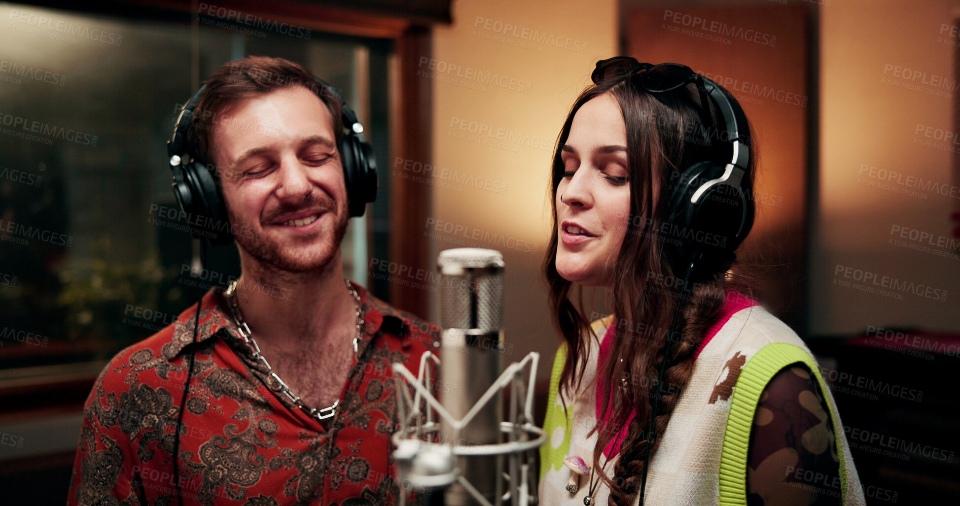Buy stock photo Singing, microphone and team with headphones in recording studio, vocal capture and song rehearsal. Tech, music artist and people with performance for album feature, creative or talent for production