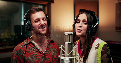 Buy stock photo Creative, people and singing in recording studio with microphone, song performance and music production. Artist, team and singer at record label with headphones, talent and collaboration for album.