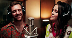 Artist, people and singing in recording studio with microphone, song performance and music production. Creative, team and singer at record label with headphones, talent and collaboration for album.