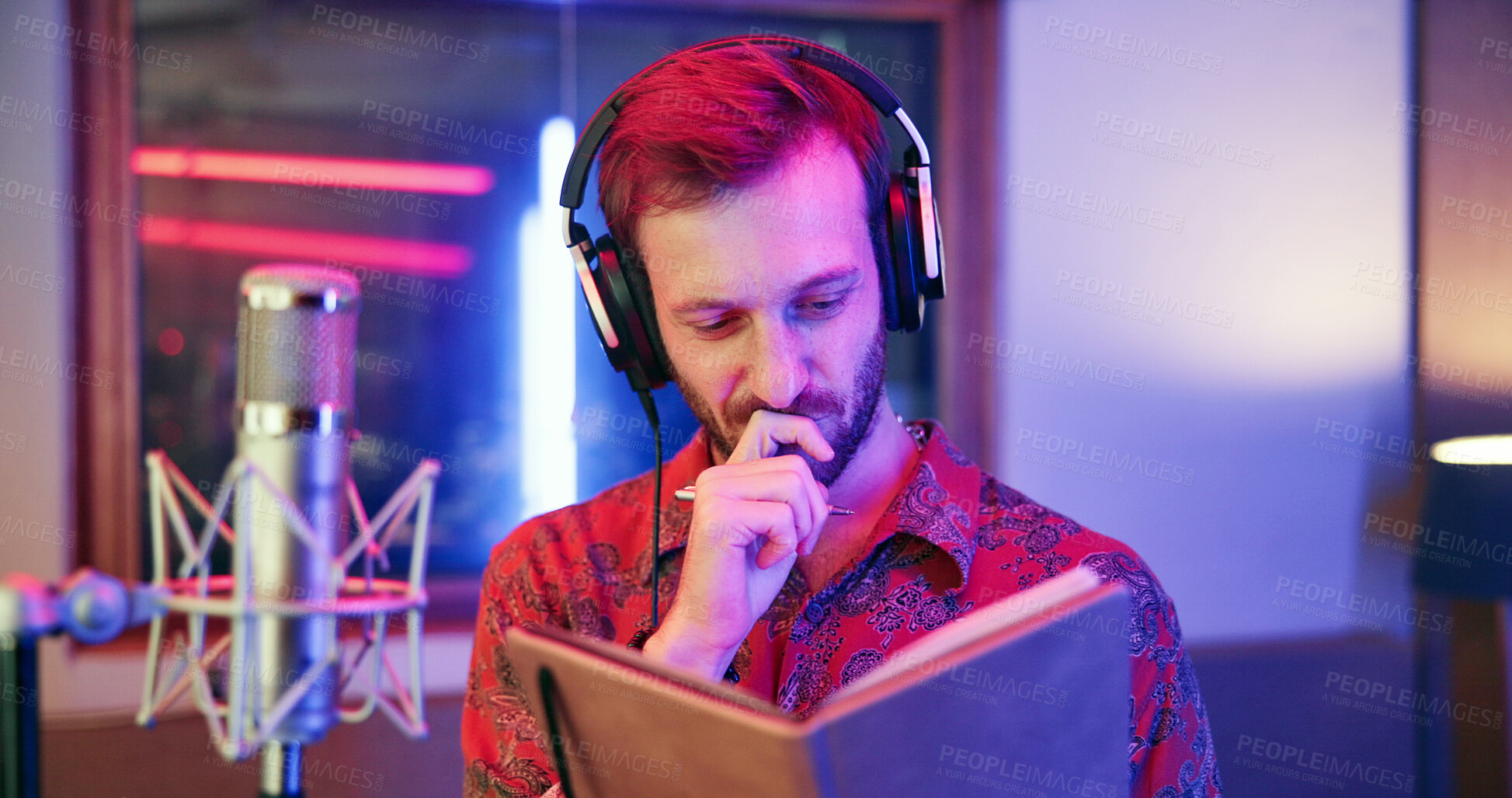 Buy stock photo Thinking, book or singer in studio with tech, songwriting or brainstorming in creative production. Reflection, mic or man in booth with headphones, melody writing or album ideas in music development.