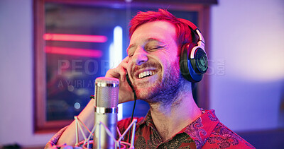 Buy stock photo Headphones, mic and singer in studio for music, production or musician in performance. Talent, pop recording and male person in booth with tech, song and sound entertainment for creative album.
