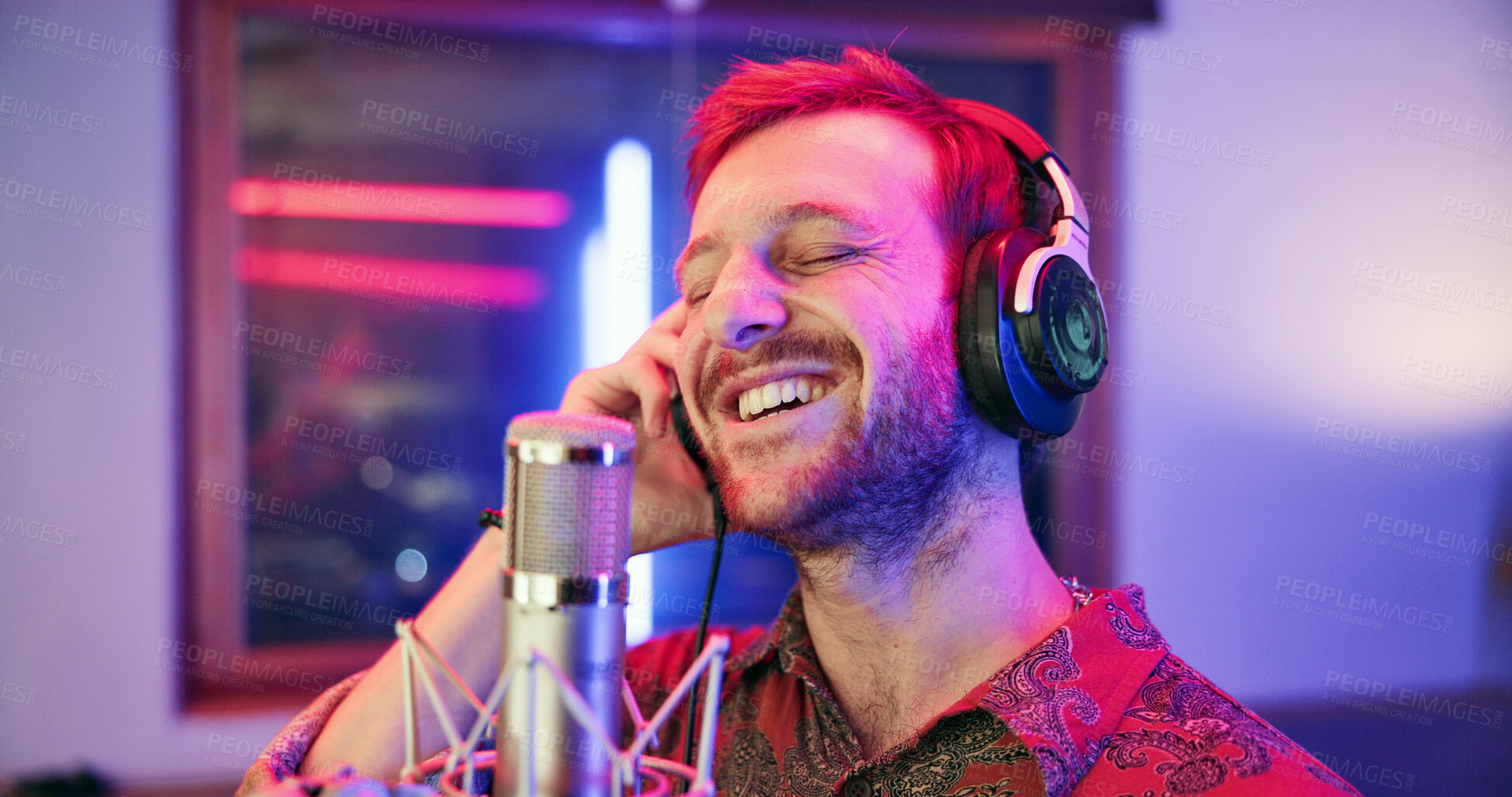Buy stock photo Headphones, mic and singer in studio for music, production or musician in performance. Talent, pop recording and male person in booth with tech, song and sound entertainment for creative album.