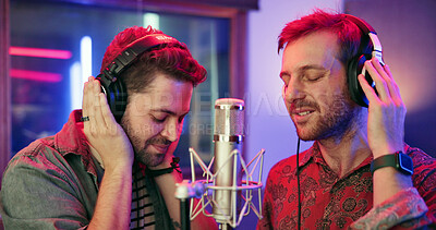 Buy stock photo Artist, men and singing in recording studio with microphone, song performance and music production. Creative duo, people and singer at record label with headphones, talent or collaboration for album.