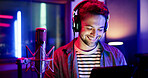 Happy man, neon or podcaster with mic on tablet for radio broadcast or record in production studio. Male person, announcer or working late with smile, technology or headphones for audio news on air