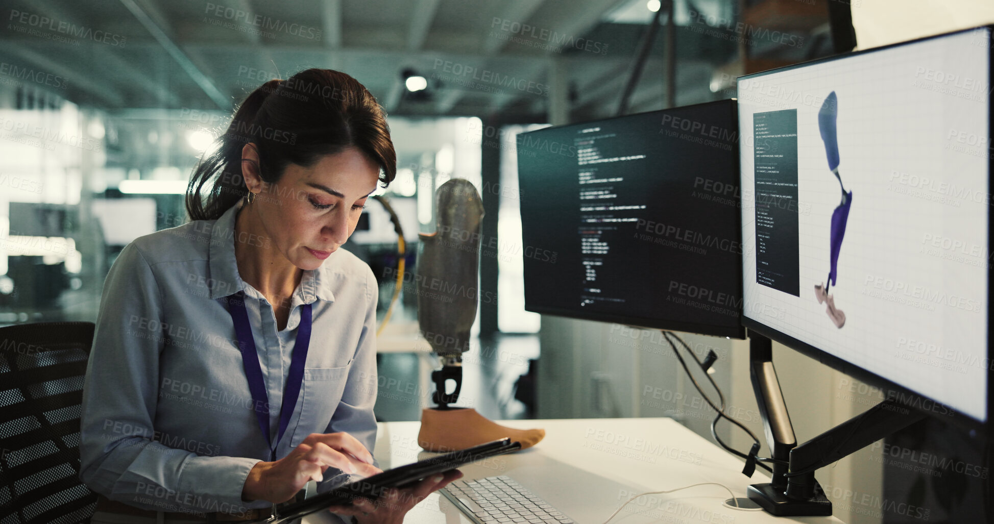 Buy stock photo Review, prosthetic or woman in lab with computer screen, design evaluation or checklist in artificial leg test. Limb, digital or engineer with tech, model development or progress in mobility research