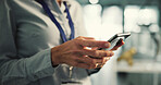 Woman, hands or typing with phone in office for research, technology enhancement or innovation. Female person, engineer or scrolling with mobile smartphone or app for digital improvement in workplace