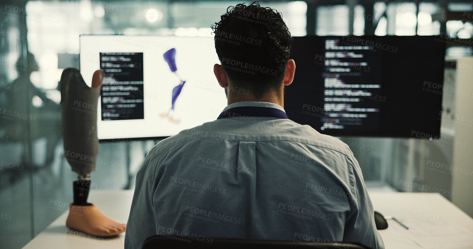 Buy stock photo Review, prosthetics or man in office with computer, design evaluation or checklist in artificial leg test. Back, limb data or engineer with tech, model development or progress in mobility research.