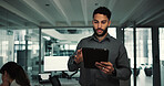 Man, programmer and typing with tablet in office for research, server update and troubleshooting. Male person, scroll and digital for programming, testing software and IT  debugging for maintenance

