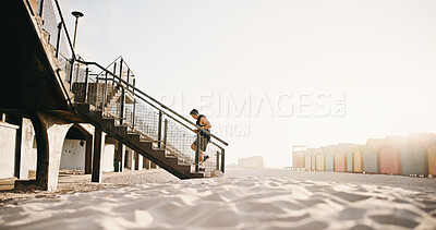 Buy stock photo Running, fitness and man on stairs by beach for exercise, workout and training for cardio, health and wellness. Athlete, sports and person with active hobby for steps, endurance and runner challenge