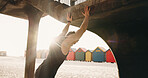 Stretching, fitness and man in city for exercise, workout and training for cardio, health and wellness. Athlete, sports and person by beach with active hobby for practice, mobility and warm up