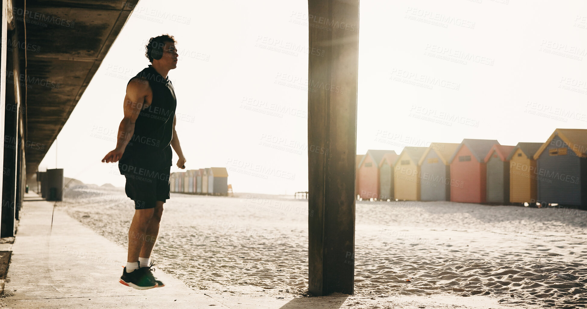Buy stock photo Skipping, fitness and man by beach for exercise, workout and training for cardio, health and wellness. Athlete, sports and person with jump rope for active hobby, endurance and challenge outdoor