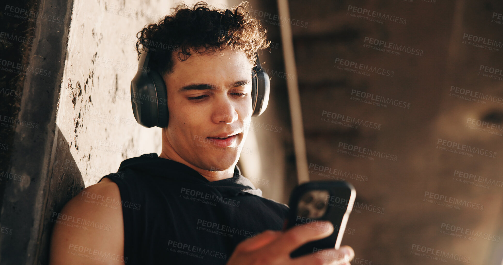 Buy stock photo Fitness, typing and man outdoor with phone for social media after training, exercise and break. Sports, athlete and person on smartphone rest for health app, internet and streaming music in town
