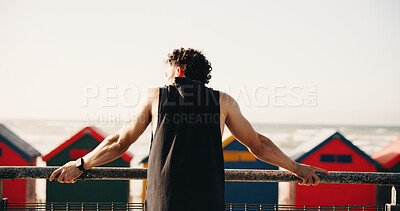 Buy stock photo Beach, athlete and man on fitness break, mockup space and thinking of wellness with exercise outdoor. Ocean, runner and person with thoughts in nature, back and healthy with workout or reflection